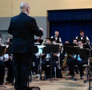 Richard, the band director, viewed from the audience. Richard, the band director, viewed from the audience.